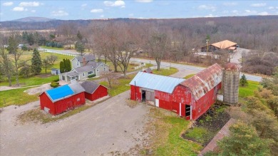 Nestled on 30.2 prime acres with development potential, this on Downing Farms Golf Course in Michigan - for sale on GolfHomes.com, golf home, golf lot