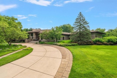 Presenting one of the most architecturally significant homes in on Watermark Country Club in Michigan - for sale on GolfHomes.com, golf home, golf lot