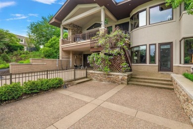 Presenting one of the most architecturally significant homes in on Watermark Country Club in Michigan - for sale on GolfHomes.com, golf home, golf lot