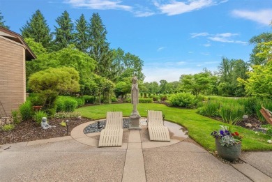 Presenting one of the most architecturally significant homes in on Watermark Country Club in Michigan - for sale on GolfHomes.com, golf home, golf lot