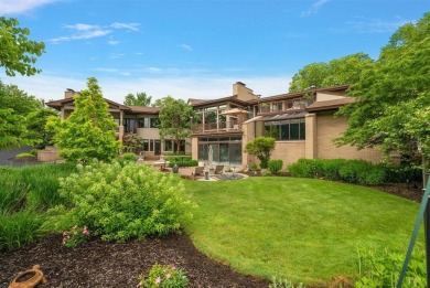 Presenting one of the most architecturally significant homes in on Watermark Country Club in Michigan - for sale on GolfHomes.com, golf home, golf lot