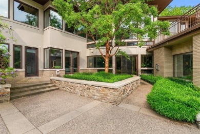 Presenting one of the most architecturally significant homes in on Watermark Country Club in Michigan - for sale on GolfHomes.com, golf home, golf lot