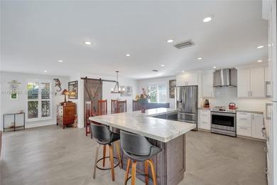 Over $300K, completely rebuilt & reimagined, sprawling 1-story on Eco Golf Club in Florida - for sale on GolfHomes.com, golf home, golf lot