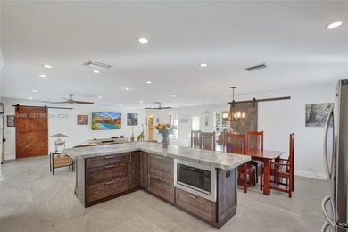 Over $300K, completely rebuilt & reimagined, sprawling 1-story on Eco Golf Club in Florida - for sale on GolfHomes.com, golf home, golf lot