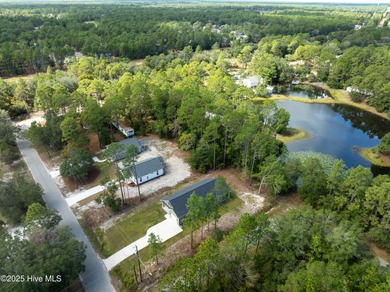 Built in 2024, this beautifully designed home offers the perfect on The Lakes Country Club in North Carolina - for sale on GolfHomes.com, golf home, golf lot