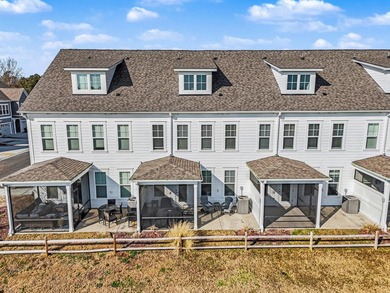 Discover exceptional coastal living in at The Townes at Barefoot on Barefoot Resort and Golf Club  in South Carolina - for sale on GolfHomes.com, golf home, golf lot