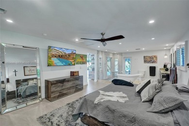 Over $300K, completely rebuilt & reimagined, sprawling 1-story on Eco Golf Club in Florida - for sale on GolfHomes.com, golf home, golf lot
