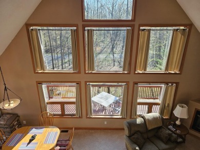 Welcome to this beautifully maintained 2-bedroom, 2-bathroom on Michaywe Pines Course in Michigan - for sale on GolfHomes.com, golf home, golf lot