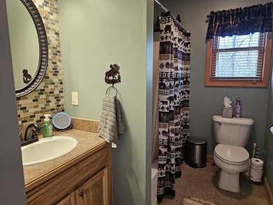 Welcome to this beautifully maintained 2-bedroom, 2-bathroom on Michaywe Pines Course in Michigan - for sale on GolfHomes.com, golf home, golf lot