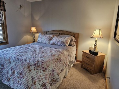 Welcome to this beautifully maintained 2-bedroom, 2-bathroom on Michaywe Pines Course in Michigan - for sale on GolfHomes.com, golf home, golf lot