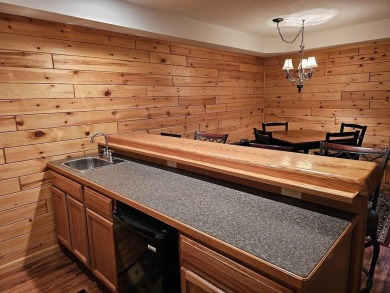 Welcome to this beautifully maintained 2-bedroom, 2-bathroom on Michaywe Pines Course in Michigan - for sale on GolfHomes.com, golf home, golf lot
