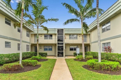 Totally turnkey, contemporary condominium in gated Kings Point on Kings Point Golf -Flanders Way in Florida - for sale on GolfHomes.com, golf home, golf lot