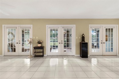 Welcome to the South Florida lifestyle.  Sweeping lake views on Deer Creek Golf Club in Florida - for sale on GolfHomes.com, golf home, golf lot