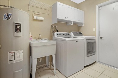 Welcome to the South Florida lifestyle.  Sweeping lake views on Deer Creek Golf Club in Florida - for sale on GolfHomes.com, golf home, golf lot