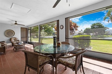 Welcome to the South Florida lifestyle.  Sweeping lake views on Deer Creek Golf Club in Florida - for sale on GolfHomes.com, golf home, golf lot