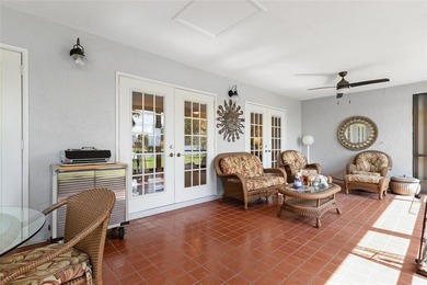 Welcome to the South Florida lifestyle.  Sweeping lake views on Deer Creek Golf Club in Florida - for sale on GolfHomes.com, golf home, golf lot