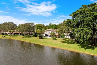 Welcome to the South Florida lifestyle.  Sweeping lake views on Deer Creek Golf Club in Florida - for sale on GolfHomes.com, golf home, golf lot