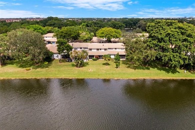 Welcome to the South Florida lifestyle.  Sweeping lake views on Deer Creek Golf Club in Florida - for sale on GolfHomes.com, golf home, golf lot