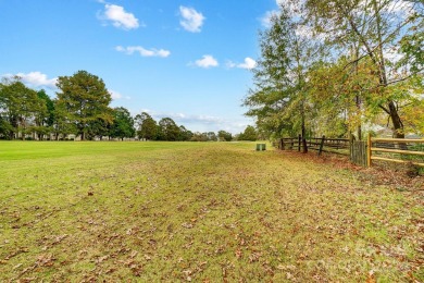 Don't miss out on living in a prime location on the 7th fairway on TPC at Piper Glen in North Carolina - for sale on GolfHomes.com, golf home, golf lot