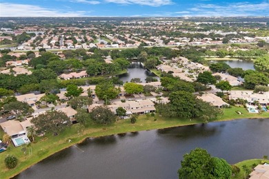 Welcome to the South Florida lifestyle.  Sweeping lake views on Deer Creek Golf Club in Florida - for sale on GolfHomes.com, golf home, golf lot