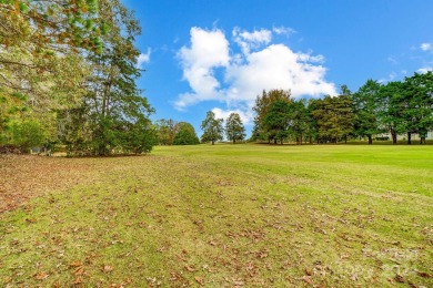 Don't miss out on living in a prime location on the 7th fairway on TPC at Piper Glen in North Carolina - for sale on GolfHomes.com, golf home, golf lot