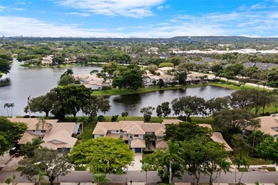 Welcome to the South Florida lifestyle.  Sweeping lake views on Deer Creek Golf Club in Florida - for sale on GolfHomes.com, golf home, golf lot