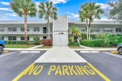 Nestled in the highly desirable Palm Aire Estates, this on Palm-Aire Country Club and Resort - The Oaks in Florida - for sale on GolfHomes.com, golf home, golf lot