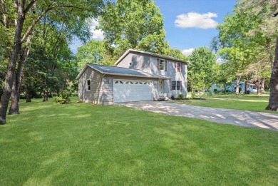 Step into tranquility w/ this stunning 3-bedroom, 1.5-bath home on Lake Monterey Golf Club in Michigan - for sale on GolfHomes.com, golf home, golf lot