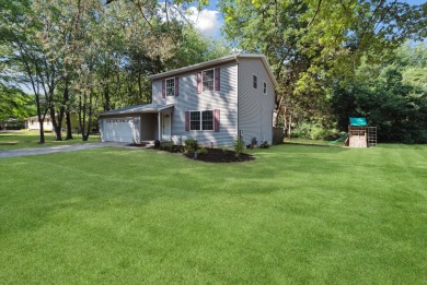 Step into tranquility w/ this stunning 3-bedroom, 1.5-bath home on Lake Monterey Golf Club in Michigan - for sale on GolfHomes.com, golf home, golf lot