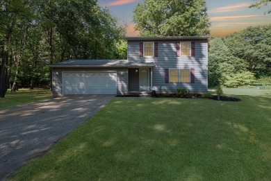 Step into tranquility w/ this stunning 3-bedroom, 1.5-bath home on Lake Monterey Golf Club in Michigan - for sale on GolfHomes.com, golf home, golf lot
