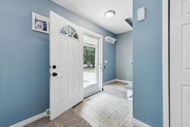Step into tranquility w/ this stunning 3-bedroom, 1.5-bath home on Lake Monterey Golf Club in Michigan - for sale on GolfHomes.com, golf home, golf lot