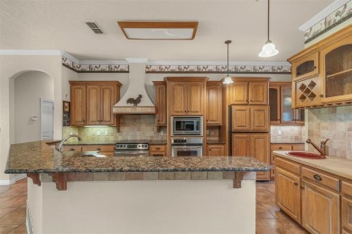 Located on the #1 Green of the Nutcracker Golf Course in the on Pecan Plantation Country Club in Texas - for sale on GolfHomes.com, golf home, golf lot