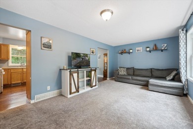 Step into tranquility w/ this stunning 3-bedroom, 1.5-bath home on Lake Monterey Golf Club in Michigan - for sale on GolfHomes.com, golf home, golf lot