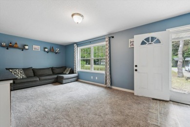 Step into tranquility w/ this stunning 3-bedroom, 1.5-bath home on Lake Monterey Golf Club in Michigan - for sale on GolfHomes.com, golf home, golf lot