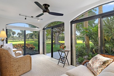 Experience effortless luxury and serene golf course views on the on Jonathans Landing Golf Club in Florida - for sale on GolfHomes.com, golf home, golf lot