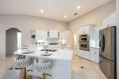 Luxury and Lifestyle welcome you to this updated home that lives on University Park Country Club in Florida - for sale on GolfHomes.com, golf home, golf lot