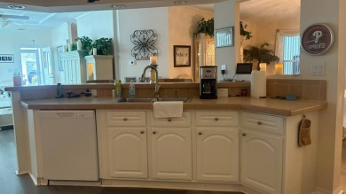 Spacious 3-Bedroom Palm Harbor with Golf Cart in 55+ on Sabal Springs Golf and Racquet Club in Florida - for sale on GolfHomes.com, golf home, golf lot