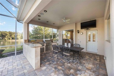 Luxury and Lifestyle welcome you to this updated home that lives on University Park Country Club in Florida - for sale on GolfHomes.com, golf home, golf lot