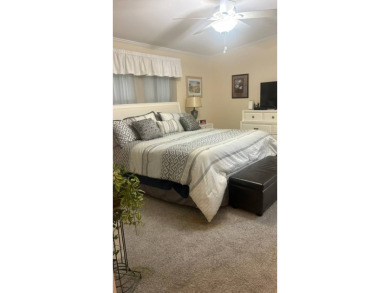 Spacious 3-Bedroom Palm Harbor with Golf Cart in 55+ on Sabal Springs Golf and Racquet Club in Florida - for sale on GolfHomes.com, golf home, golf lot