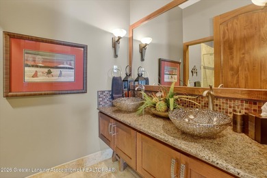 Set on two lots on the Hawk Hollow Golf Course, this sprawling on Hawk Hollow Golf Course  in Michigan - for sale on GolfHomes.com, golf home, golf lot