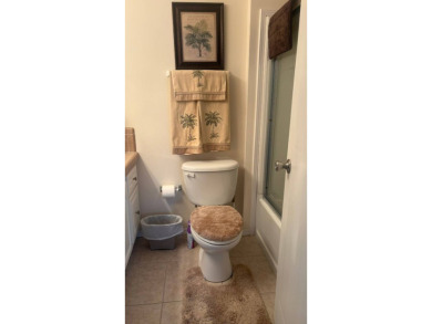 Spacious 3-Bedroom Palm Harbor with Golf Cart in 55+ on Sabal Springs Golf and Racquet Club in Florida - for sale on GolfHomes.com, golf home, golf lot