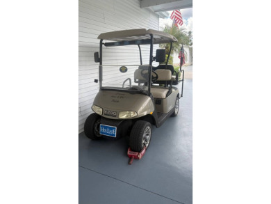 Spacious 3-Bedroom Palm Harbor with Golf Cart in 55+ on Sabal Springs Golf and Racquet Club in Florida - for sale on GolfHomes.com, golf home, golf lot