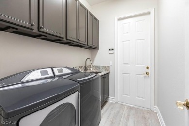 Exquisitely Renovated Home in the Verandah Gated Community. This on Verandah Golf Course and Club in Florida - for sale on GolfHomes.com, golf home, golf lot