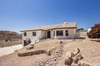 Welcome to this beautifully updated home in the desirable on London Bridge Golf Course in Arizona - for sale on GolfHomes.com, golf home, golf lot