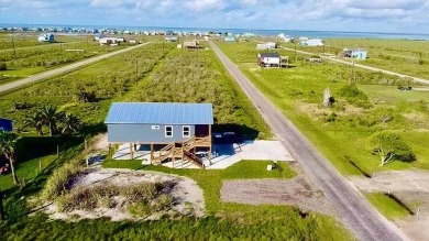 Welcome to your coastal paradise! This stilted beach-style on Lamar Golf Course in Texas - for sale on GolfHomes.com, golf home, golf lot