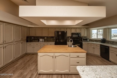 Welcome to this beautifully updated home in the desirable on London Bridge Golf Course in Arizona - for sale on GolfHomes.com, golf home, golf lot
