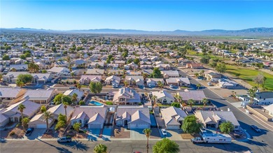 Welcome to your new home in the desirable Fairway Estates on Desert Lakes Golf Course in Arizona - for sale on GolfHomes.com, golf home, golf lot