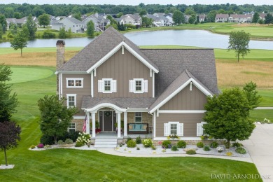 Stunning Macatawa Legends home on sought after Grand Point. This on The Macatwa Legends Golf Course in Michigan - for sale on GolfHomes.com, golf home, golf lot