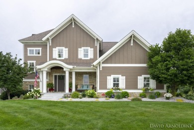 Stunning Macatawa Legends home on sought after Grand Point. This on The Macatwa Legends Golf Course in Michigan - for sale on GolfHomes.com, golf home, golf lot