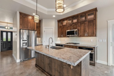 Spacious and thoughtfully designed, this 4-bedroom, 3.5-bath on Hunters Point Golf Club in Idaho - for sale on GolfHomes.com, golf home, golf lot